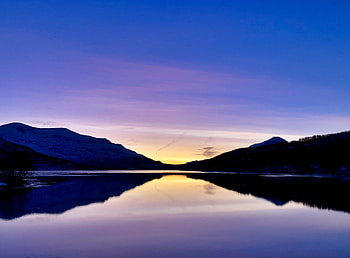 Sunset, bluish sky and lake, mountains HD wallpaper