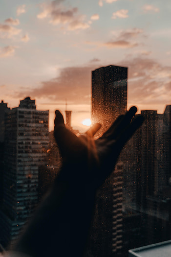 Sunset, Sun, City, Hand, Miscellanea, Miscellaneous, Rays, Beams HD phone wallpaper