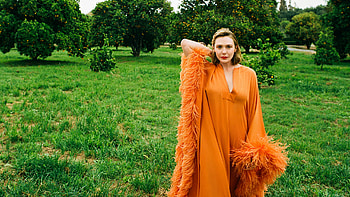 Short Hair Elizabeth Olsen Girl Model Is Standing On Grass Wearing Orange Color Dress Girls HD wallpaper