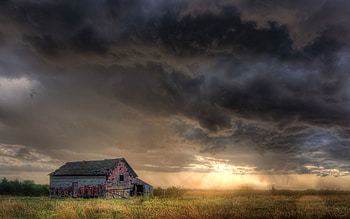 Abandoned cabin under the stormy sky . HD wallpaper