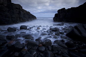 Rocks, pebbles, mist, sea, coast, nature HD wallpaper
