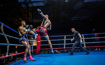 Muay Thai, Powerful kicks, Boxing ring, Fighter's intensity HD wallpaper