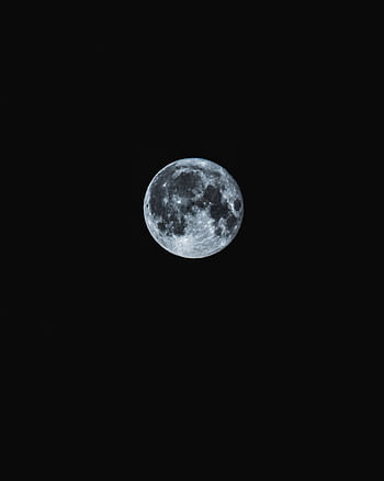 A stunning full moon shining brightly against a dark night sky, capturing celestial beauty. HD phone wallpaper