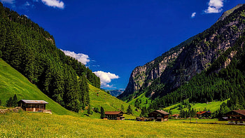 Beautiful Austrian Alpine Valley, alps, clouds, landscape, cabins, trees, sky HD wallpaper