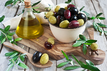 Olives, wooden, leaves, olive oil, bowl, spoon HD wallpaper