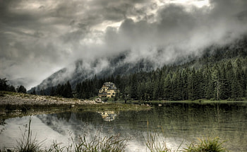 House on the Lake, weeds, windows, doors, land, day, trees, water, architecture, house, grass, ground, lake, mountain, wood, clouds, nature, forest HD wallpaper