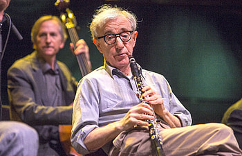 Woody Allen concert, Topless protesters, Unwanted interruption, Controversial incident HD wallpaper