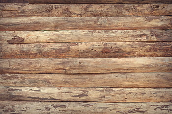 Close-up of weathered wooden planks creating a rustic textured background. HD wallpaper