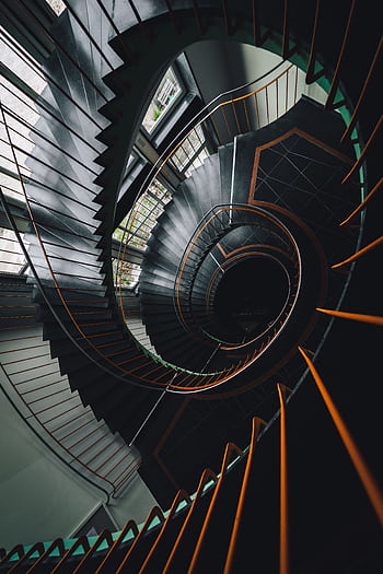 Stunning spiral staircase captured in a high-angle architectural shot in Dresden, Germany. HD phone wallpaper