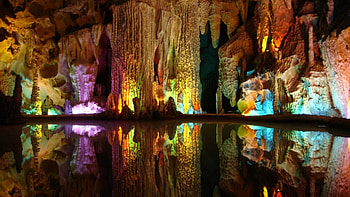 colored lights reflected inside a beautiful cave, lights, colors, cave, pool, stalactites, reflections HD wallpaper