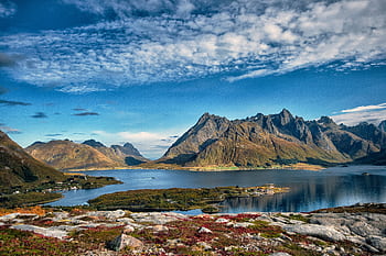 A que view of Lofoten Islands' mountains and serene fjord, under a vibrant sky in Nordland, Norway. HD wallpaper