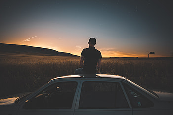 Boy Sitting On Top Of Car Watching Nature View , graphy, man, boy, nature, cars HD wallpaper