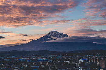Mountain beside city, clouds, aerial view HD wallpaper