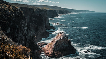 Jagged edges of Storms River, South Africa, waves, clouds, sky, rocks, cliff, water HD wallpaper