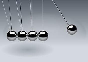 Dynamic illustration of Newton's Cradle showing motion and reflection concepts in physics. HD wallpaper