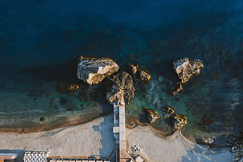 Pier, rocks, aerial view, beach, nature HD wallpaper