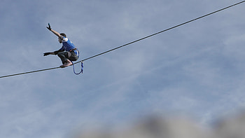 Balancing on a slackline, Mountain tightrope, Test of skill, Adrenaline challenge HD wallpaper