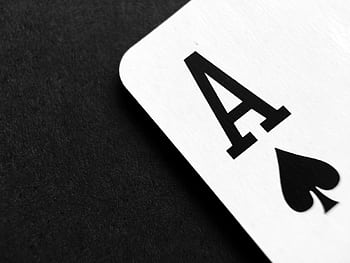 Detailed view of an Ace of Spades card symbolizing luck and strategy. HD wallpaper