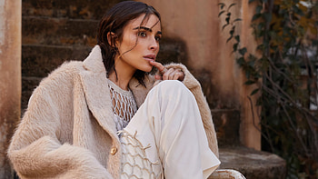 Girl Model Olivia Culpo Is Sitting On Chair Wearing White Dress And Fur Overcoat Girls HD wallpaper