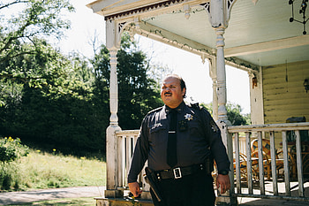 Bugonia: Lawman on Porch — Movie, Movie, Police HD wallpaper