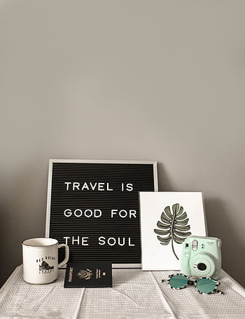 A travel-themed flat lay with a camera, coffee, and motivational quote. HD phone wallpaper