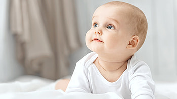 Cute Blue Eyes Baby Is Lying Down On White Cloth Wearing White Dress Cute HD wallpaper