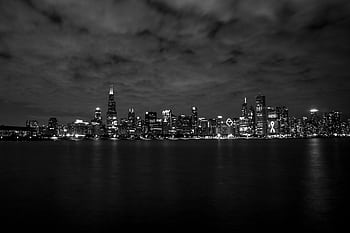 Dramatic black and white of Chicago skyline at night across the water. HD wallpaper