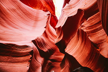 Explore the breathtaking swirls and vibrant hues of Antelope Canyon's sandstone formations. HD wallpaper