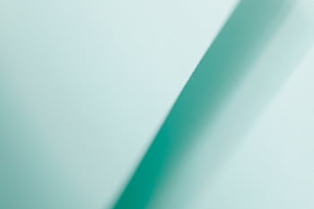Abstract turquoise gradient background featuring a diagonal line, perfect for modern design projects. HD wallpaper