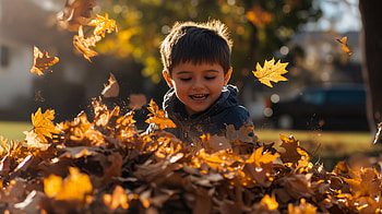 Joyful Autumn Play in a Leaf Pile - Ultra, leaf pile, Autumn, child, leaf, playing HD wallpaper