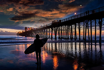Surfing, pier, beach, surf, clouds, nature, sky, splendor, sunset HD wallpaper