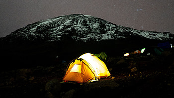Yellow Tent With Light Trees Snow Capped Mountain During Nighttime Under Starry Sky Dark Background HD wallpaper