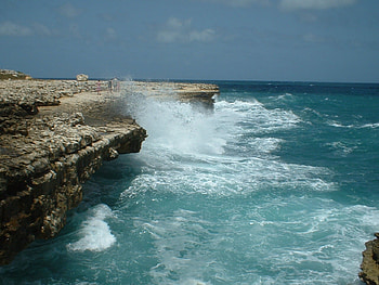Devils Bridge, sea, waves, blue green, coast, layers, battered, sky, rocks HD wallpaper