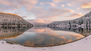 winter reflecting in a mirrored lake, winter, hills, forwsts, clouds, lake, reflections HD wallpaper