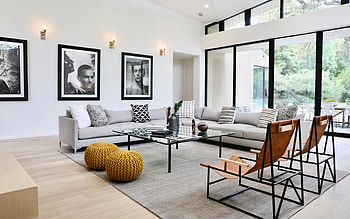 stylish interior design, living room, gray large sofa, paintings with portraits, modern interior style, idea for a living room in a house HD wallpaper