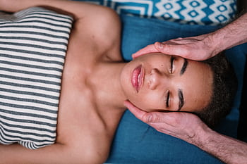 A serene facial massage providing relaxation and stress relief. HD wallpaper