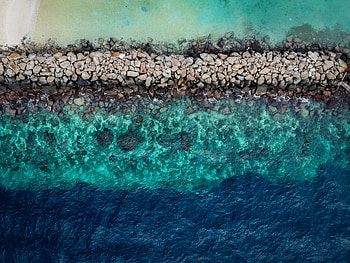 Blue green water, aerial view, rocks, coast HD wallpaper