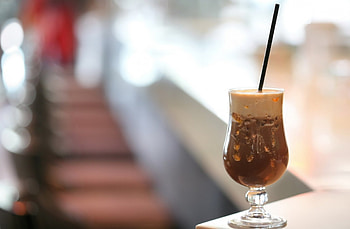 Coffee with orange-cinnamon flavor, cold, espresso, flavor, cinnamon, orange, tall, cafe, freddo, coffee, glass HD wallpaper
