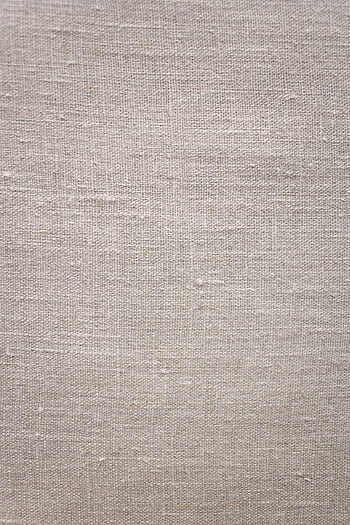 Detailed shot of natural beige linen texture providing a rustic and elegant fabric background. HD phone wallpaper