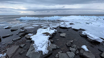Frozen Snow Stones Pebbles Ocean Coast Under White Clouds Sky Nature HD wallpaper