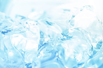 Abstract close-up of ice cubes against a bright blue background, capturing the essence of freshness. HD wallpaper