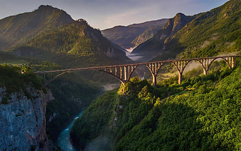 bridge over the canyon, arch bridge, valley, evening, sunset, beautiful bridge, forest, mountain landscape HD wallpaper