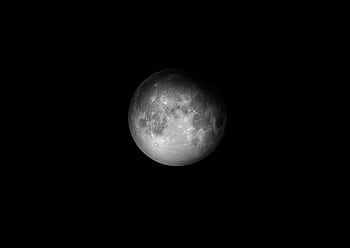Stunning black and white of the moon against a dark night sky, perfect for backgrounds. HD wallpaper