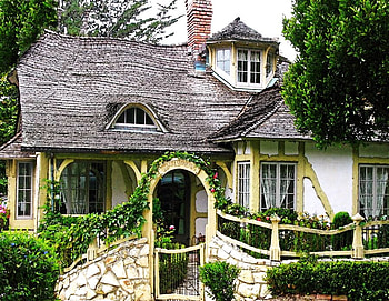 Little cottage in the woods, trees, archway, vines, flowers, cottage, yellow trim, rock HD wallpaper