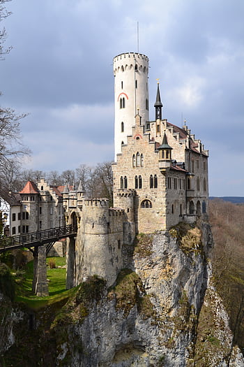 Capture of the stunning Lichtenstein Castle perched on a cliff, showcasing medieval architecture and rich history. HD phone wallpaper