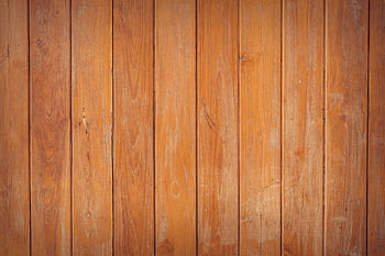 Close-up of rustic wooden planks with a natural grain texture, ideal for backgrounds. HD wallpaper