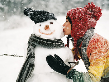 Kissed snowman, winter, snowman, snow, nature, girl, people HD wallpaper