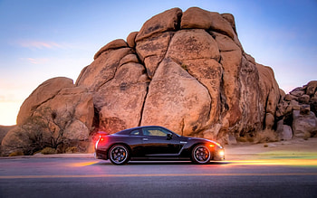 nissan gt at dusk r, lights, car, road, r, dusk, rocks HD wallpaper