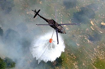 S-70 Black Hawk, black, hawk, s70, flames, flame, blackhawk, chopper, austria, helicopter, heli, water, fire HD wallpaper
