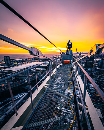 Cities, Sunset, City, Skyscraper, Overview, Review, Height, Human, Person HD phone wallpaper